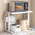 Adjustable 2-Tier Microwave Oven Shelf, Extendable Kitchen Baker Rack with Chopstick Holder, Space-Saving Countertop Storage, White Design for Home Organization